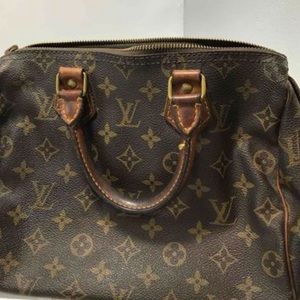 Louis Vuitton leather canvas bag  comes with COA